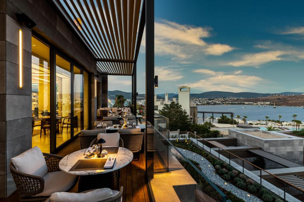 Фото отеля THE NORM LE CHIC (EX. KAYA PALAZZO RESORT & RESIDENCES BODRUM), 1
