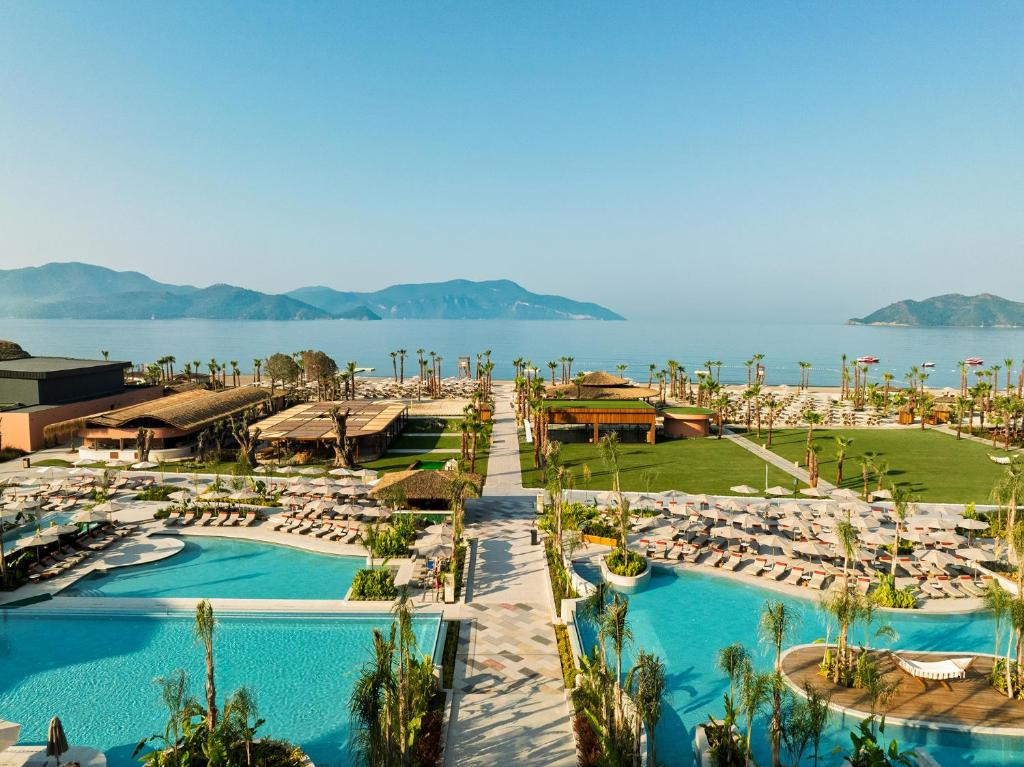 Фото отеля XO CAPE ARNNA CLUB ADULTS ONLY, 1